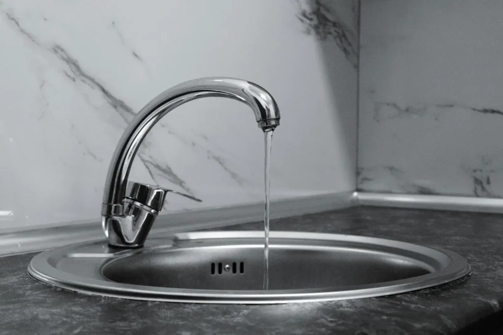 Modern faucet with running water