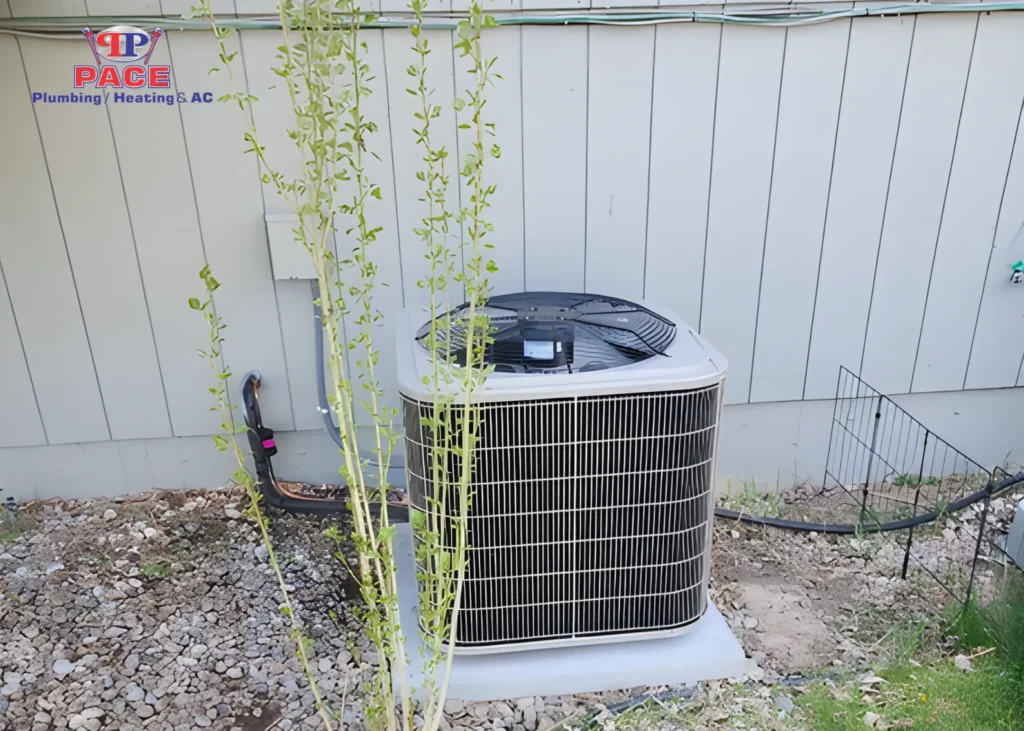 Air conditioning unit beside a wall